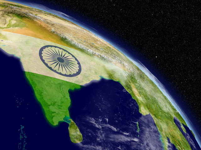 India with flag from space