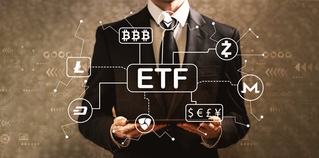 Cryptocurrency ETF theme with businessman holding a tablet compu