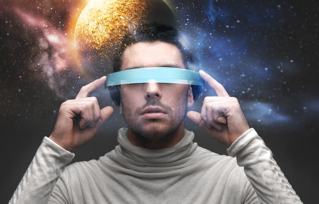 man in 3d glasses over space background
